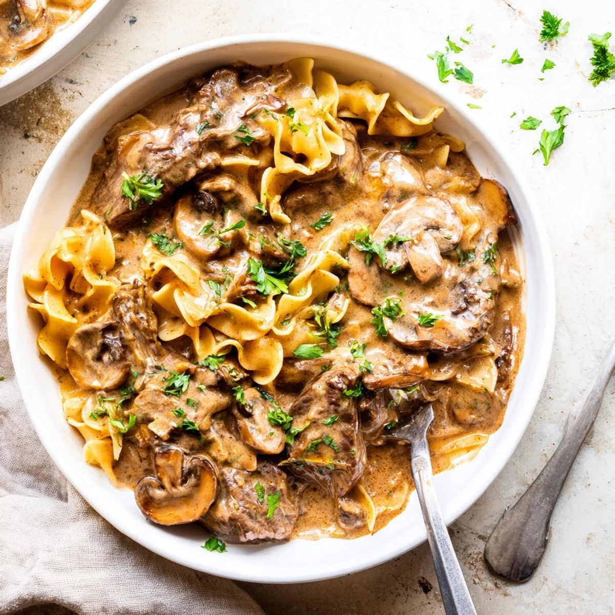 Delicious One-Pot Beef Stroganoff served over egg noodles for a hearty meal.
