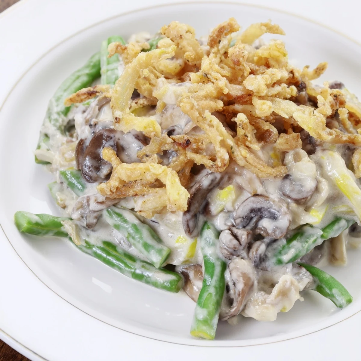 Creamy Old-School Green Bean Casserole with tender beans and mushrooms, perfect for a holiday meal.