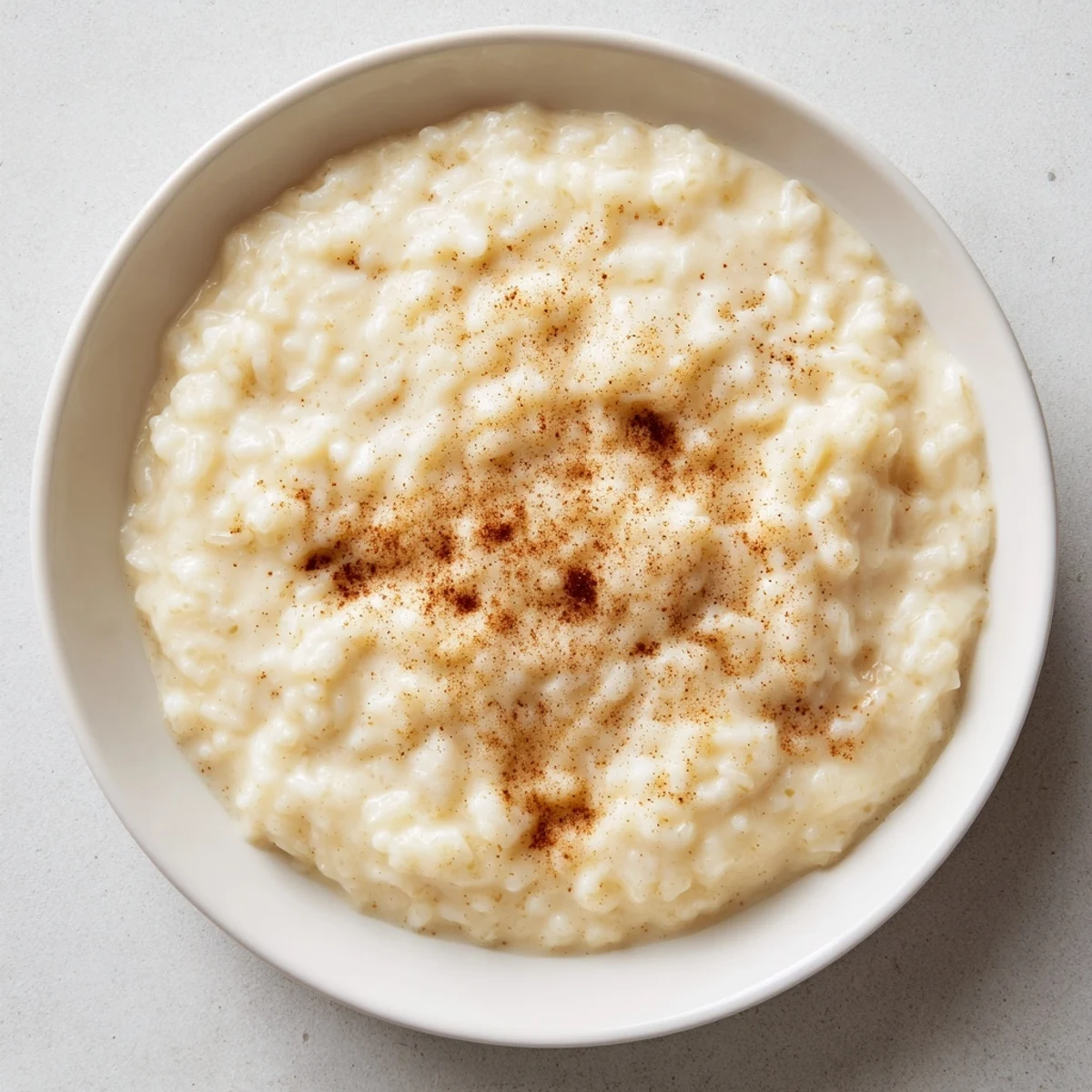 Imagine a comforting spoonful of sweet Rice Pudding with Leftover Rice, perfectly smooth and gently spiced.