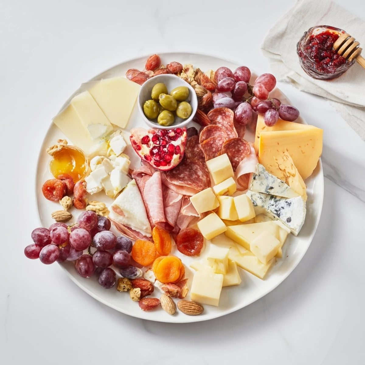 Christmas 2025 Festive Grazing Board overflowing with cheeses, meats, and colorful fruits, perfect for holiday gatherings.