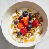 A close-up of a Cottage Cheese Hot Honey Bowl showcasing the vibrant colors and sweet, spicy flavors.