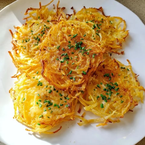 Golden, air-fried Crispy Onion Cheese Chips, a savory snack with melted cheese and crispy edges.