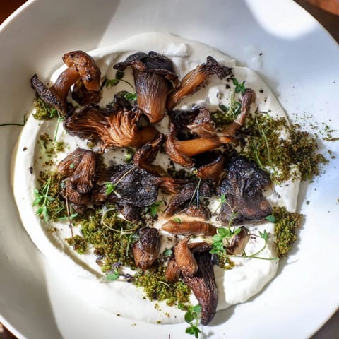 A beautifully arranged Cottagecore: Mushroom and Moss Platter with rustic sourdough and colorful radish slices, ready to share.