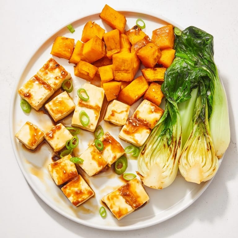 Savory Miso-Glazed Tofu & Winter Squash with tender bok choy, a vibrant and flavorful vegan dinner.