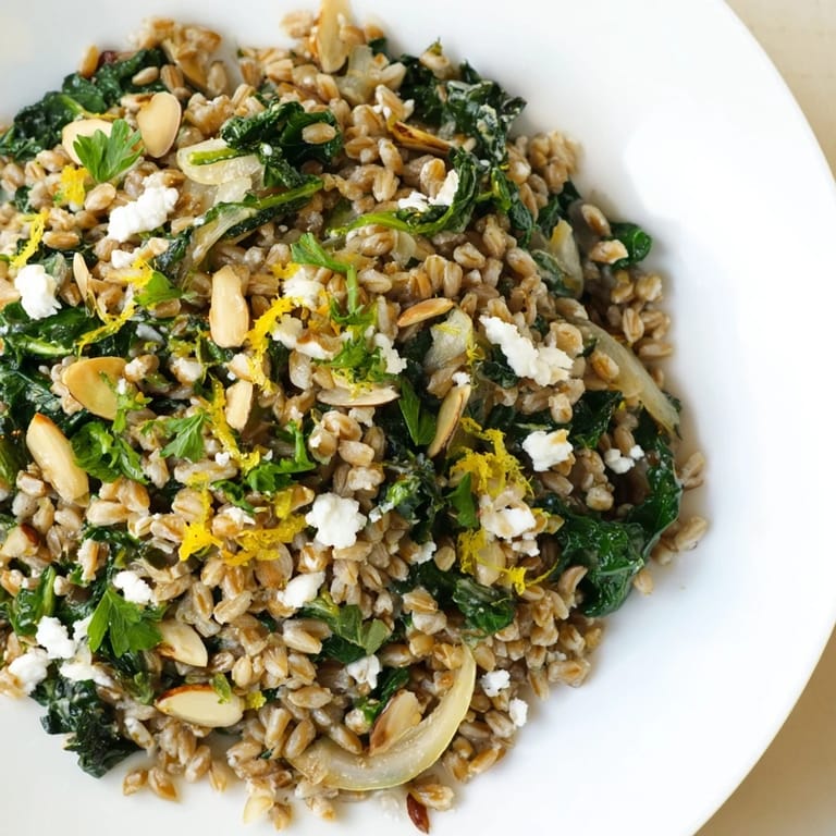 A vibrant, close-up shot of a comforting Farro & Greens Pilaf ready to enjoy as a flavorful meal.