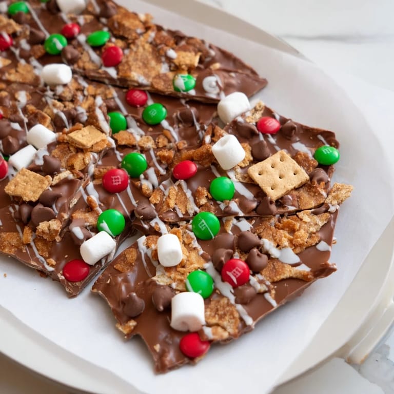 Enjoy the crunch and flavor of this Quick Christmas Smores Bark, a delightful holiday dessert with festive sprinkles.