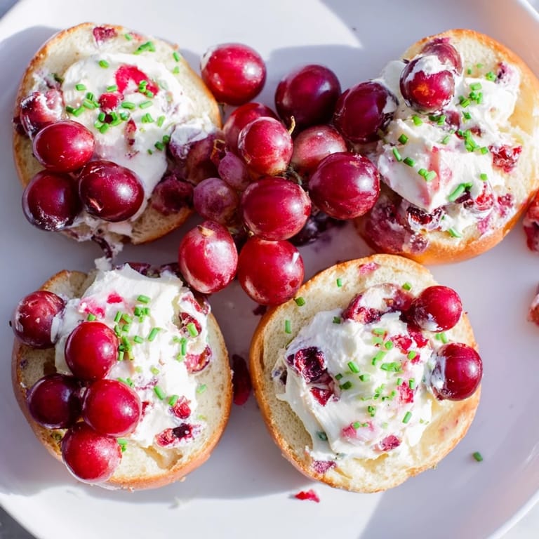 A gorgeous overhead shot of a cranberry sleigh bagel board, perfect for a holiday brunch spread.