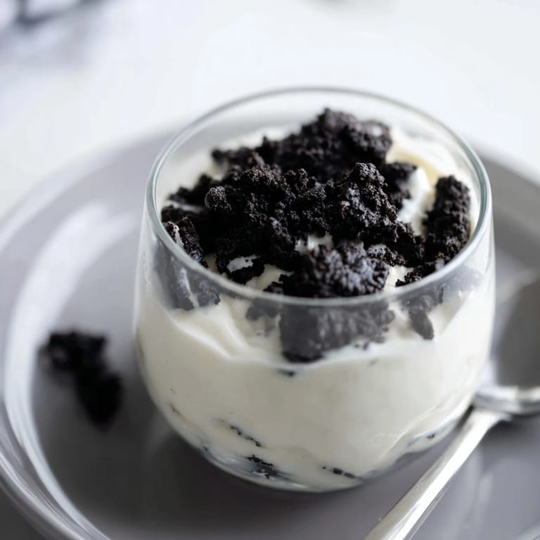 Homemade Vanilla Pudding with Crushed Oreos, a quick and easy American dessert, is visually stunning.
