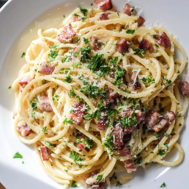 Imagine the rich, creamy sauce coating the perfect Creamy Garlic Bacon Pasta, flavorful and delicious.